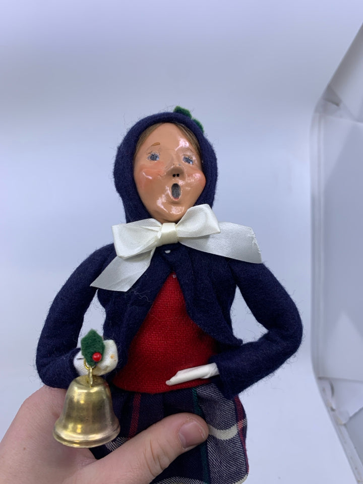 GIRL CAROLER W/ DARK BLUE COAT HOLDING BELL 1988 BYERS' CHOICE.