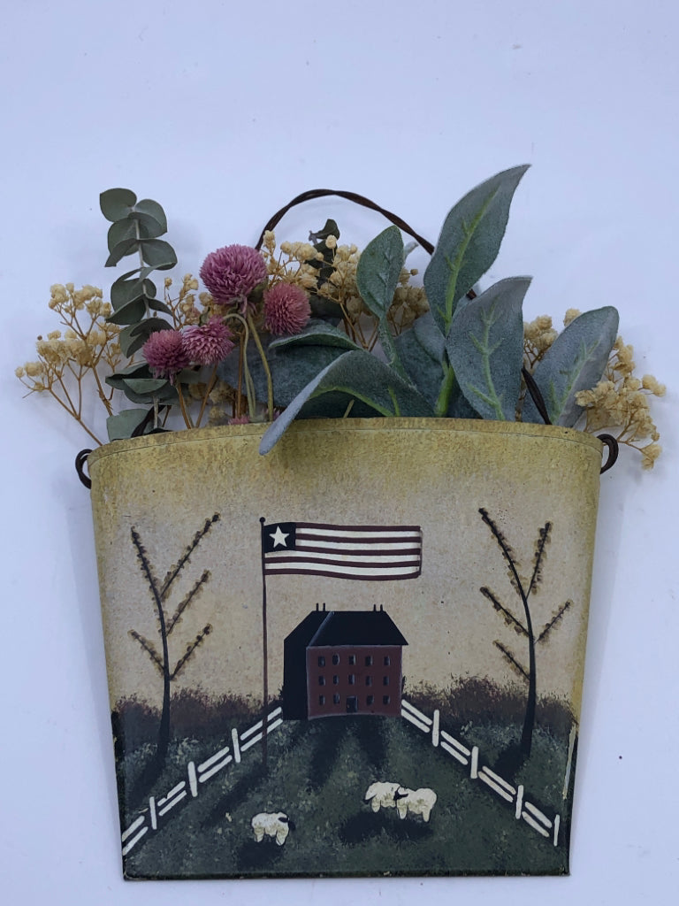SMALL METAL WALL POCKET W/ PRIMITIVE HOUSE+SHEEP FAUX FLORAL BOUQUET.