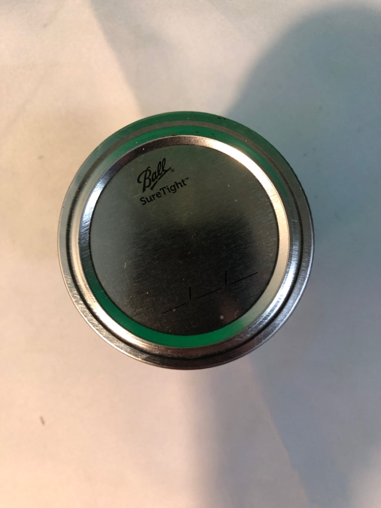 SMALL BALL JAR FILLED W/ BUTTONS.