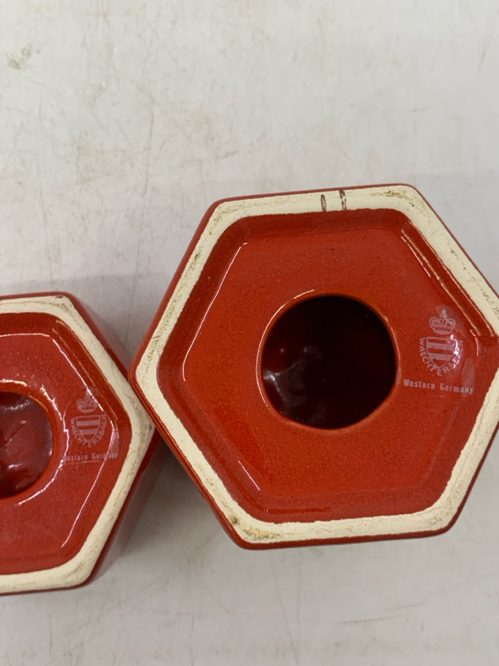 2 HEXAGON CERAMIC TEA LIGHT HOLDERS.