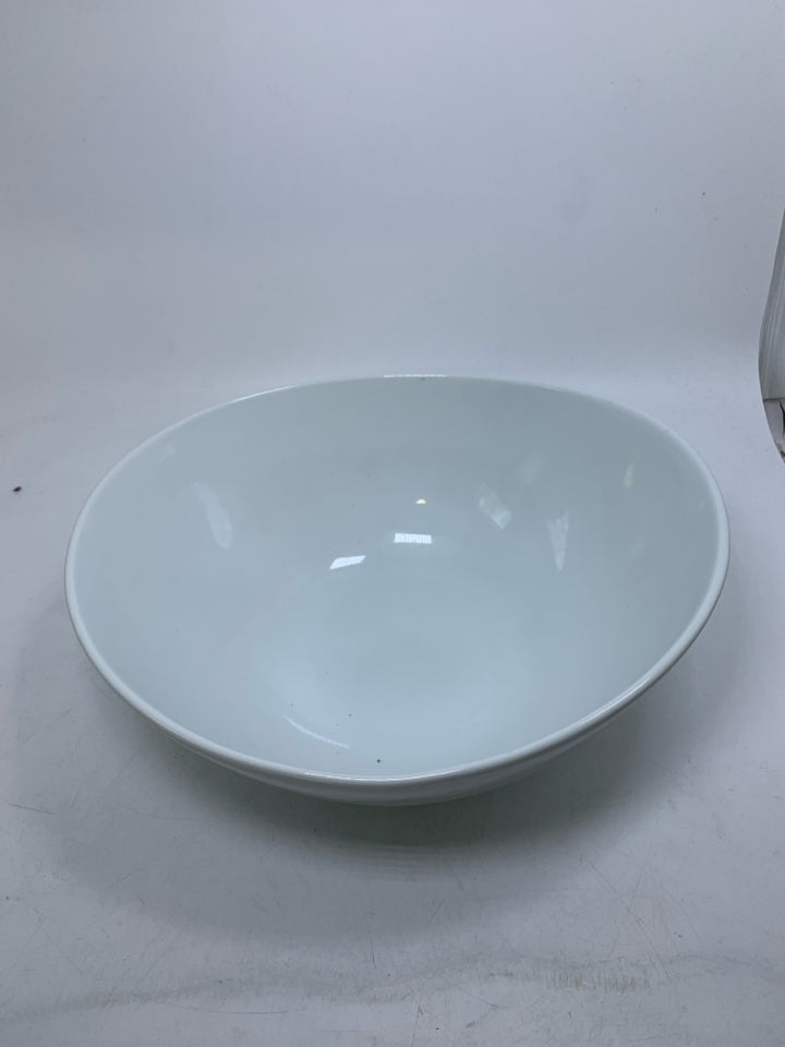 FOOTED OVAL SLANTED SIDES SERVING BOWL.