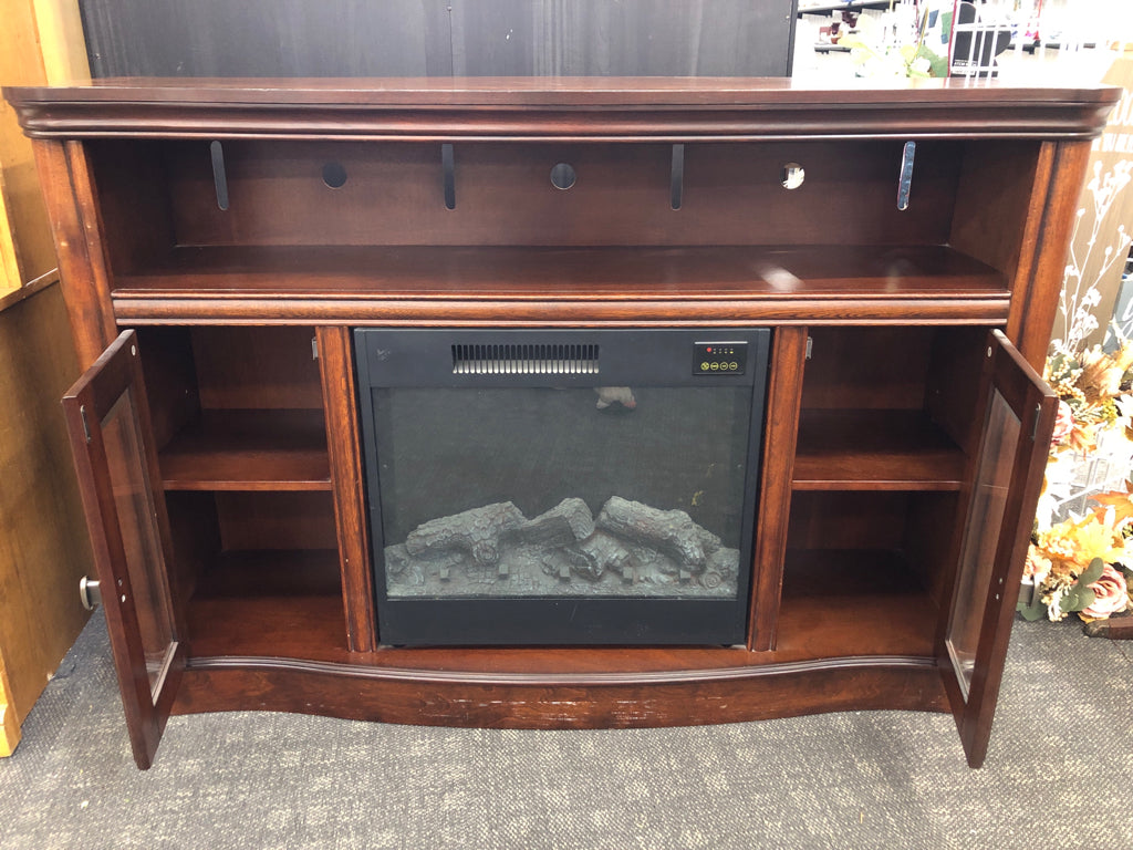 DK WOOD MEDIA CABINET W/FAUX ELECTRIC FIREPLACE.