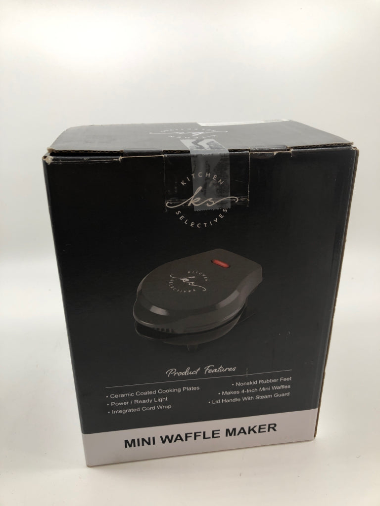NIB MINI WAFFLE MAKER.