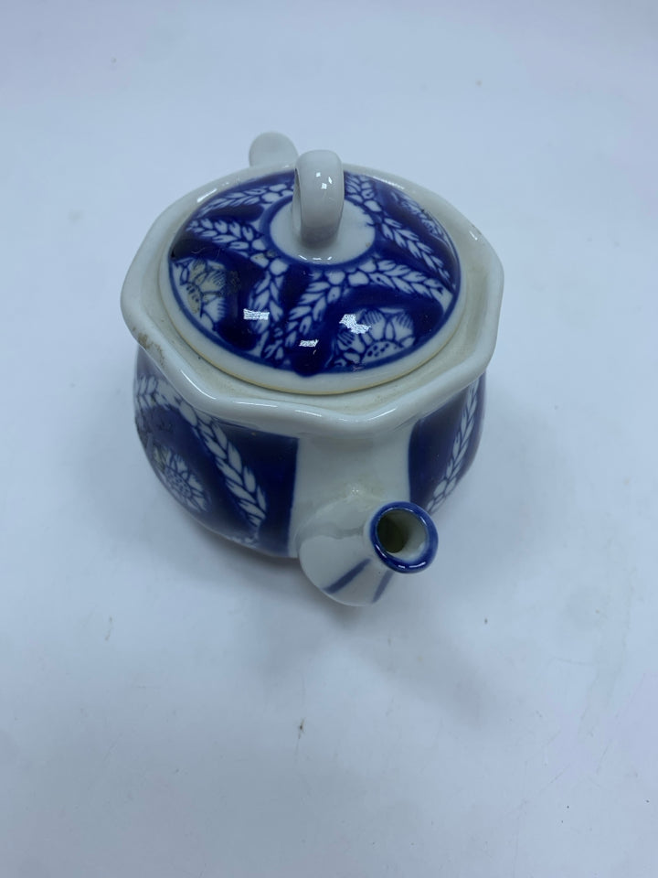 COBALT BLUE TEAPOT W/LEAF PATTERN.