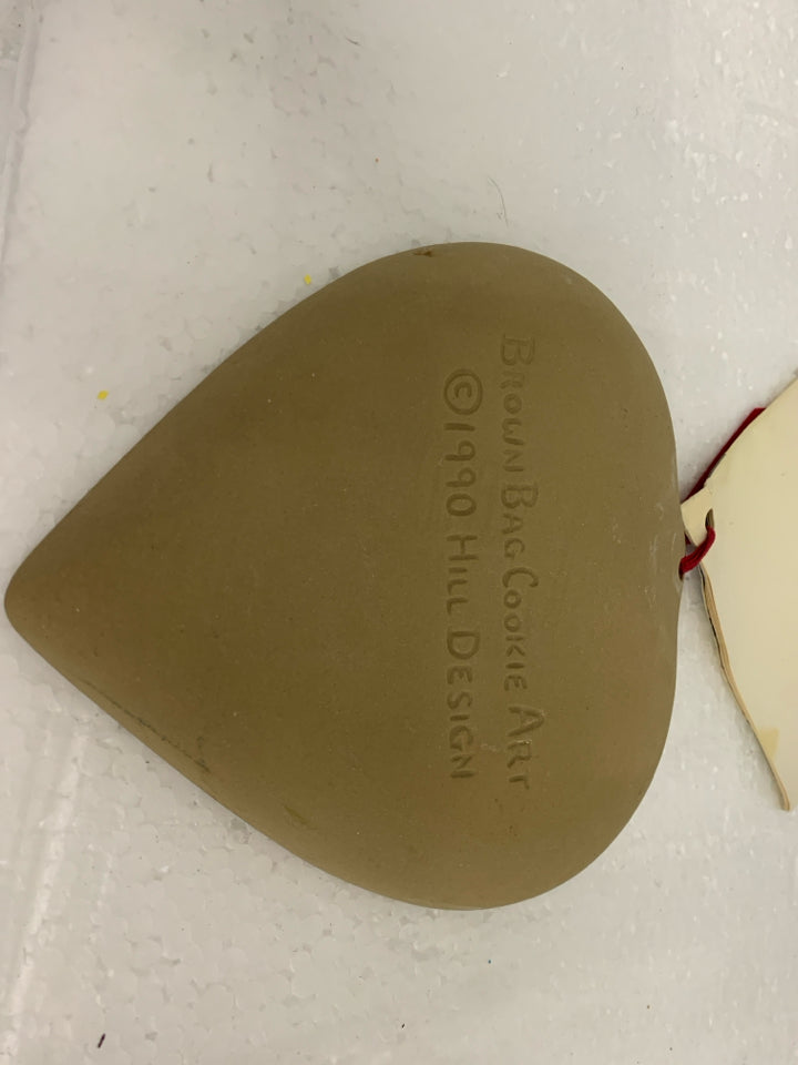 HEART SHAPED STONEWARE COOKIE PRESS BROWN BAG.