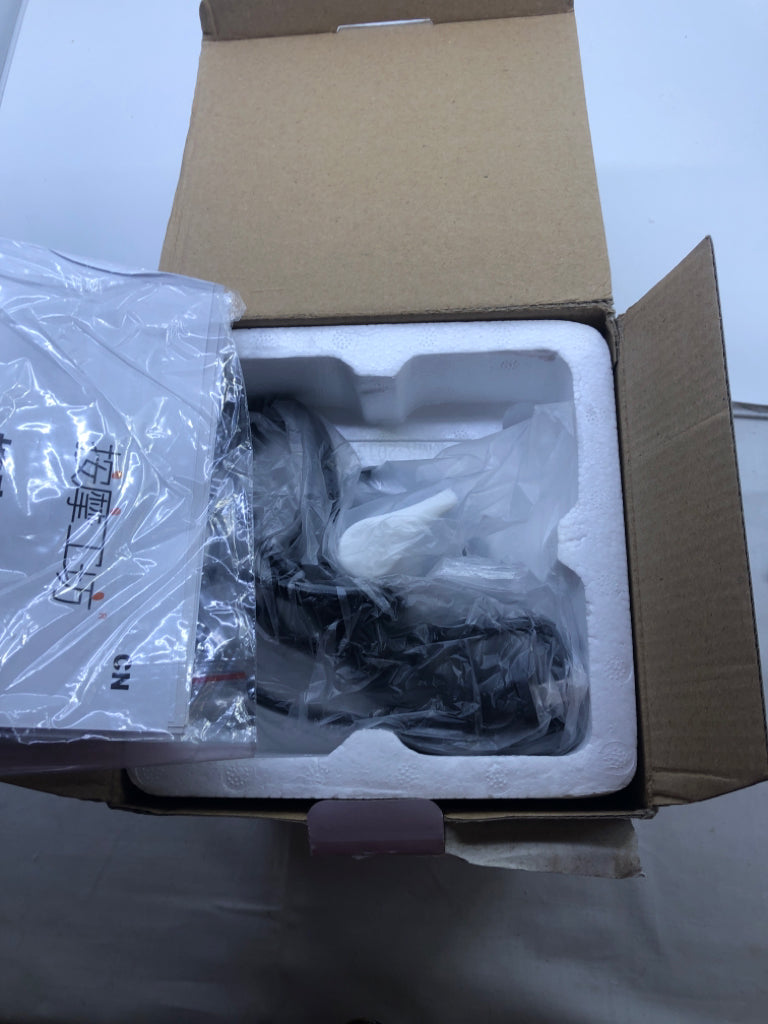 NIB MESSAGE OIL WARMER.