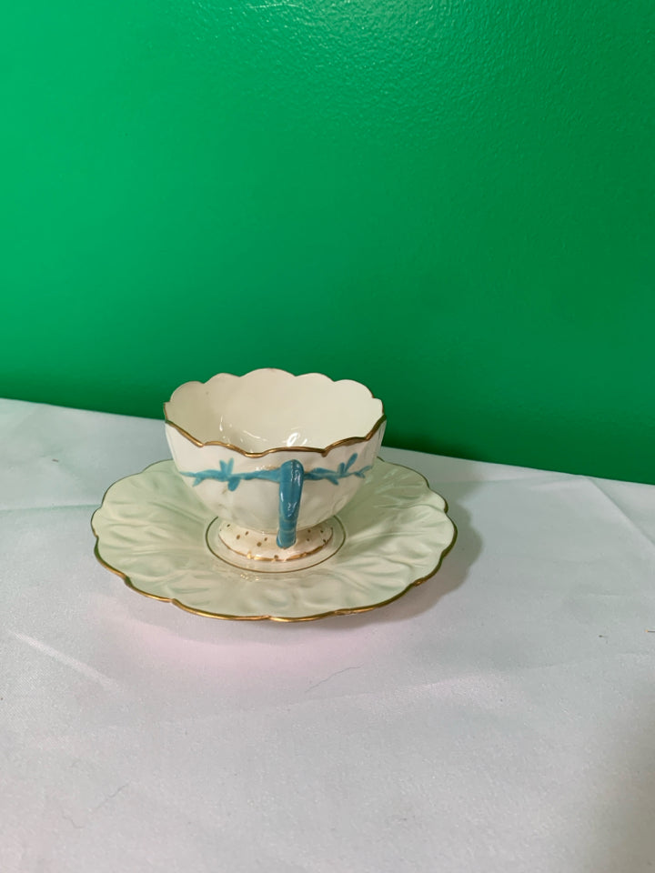 VTG CREAM AND GOLD ACCENT TEACUP AND SAUCER.
