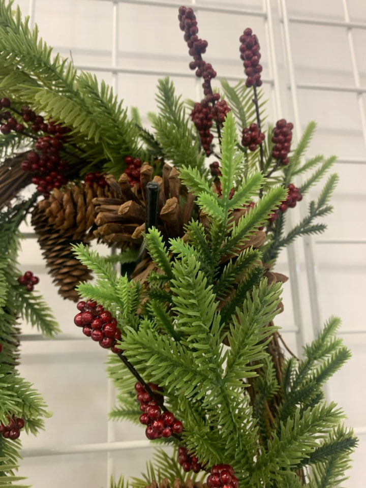 PINECONES AND RED PIP BERRY GARLAND.
