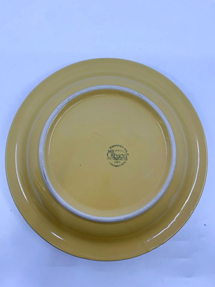 4 MUSTARD YELLOW LUNCH PLATES.