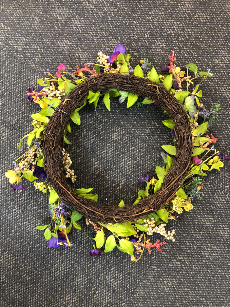 YELLOW AND PURPLE FAUX FLOWER WREATH.