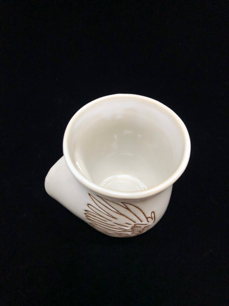 WHITE WING EMBOSSED CERAMIC COFFEE MUG.