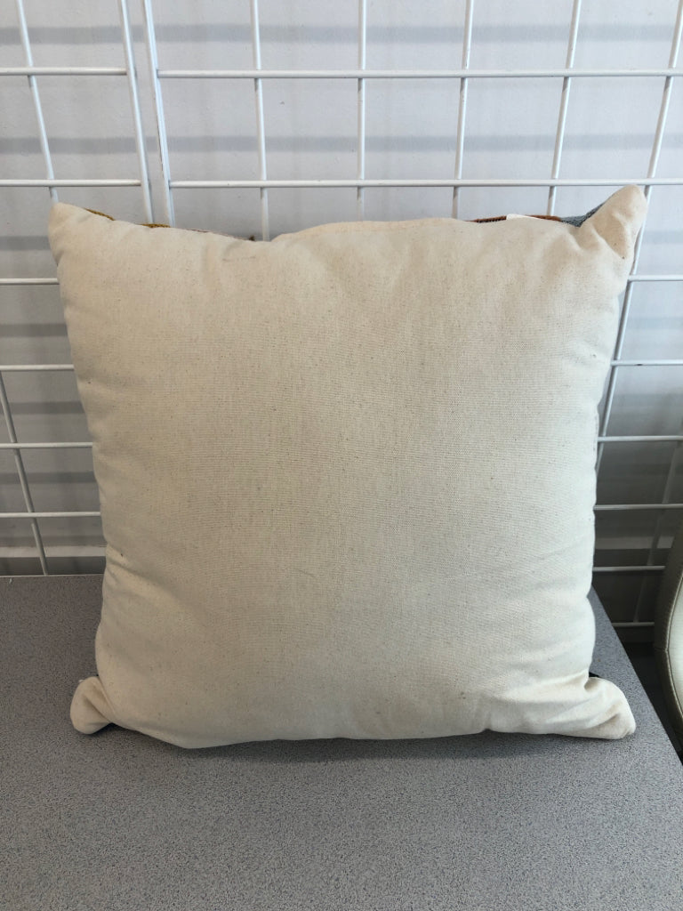 MULTI-COLOR ABSTRACT STITCHED PILLOW.