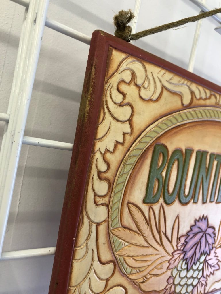 WOOD HANGING PICTURE WITH THE WORD BOUNTIFUL.