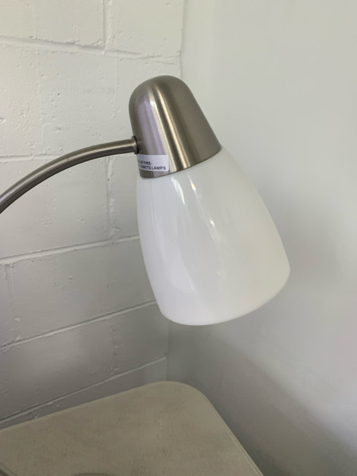 STAINLESS STEEL CURVED BASE LAMP W/ WHITE PLASTIC SHADE.