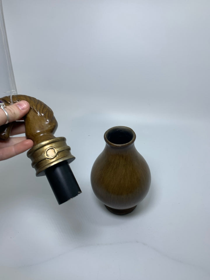 LIGHT BROWN CERAMIC DECANTER W/ HORSE HEAD STOPPER.