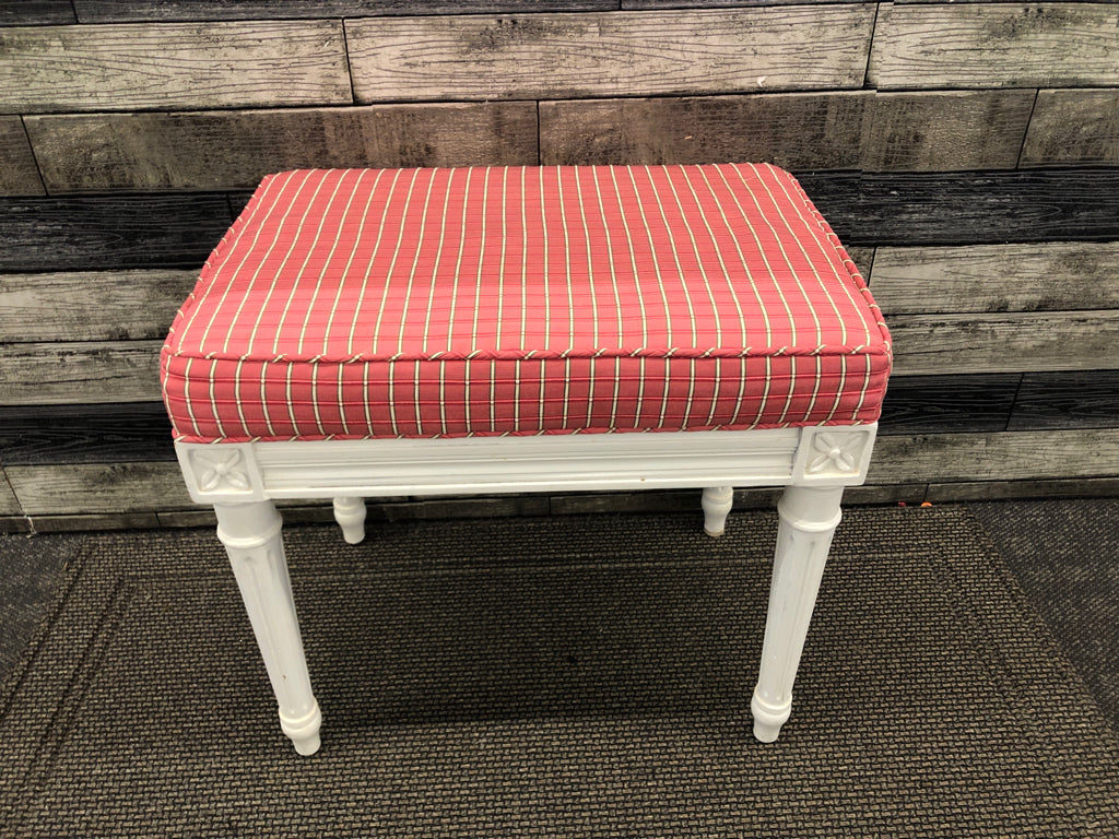 WHITE WOOD FOOTED STOOL W PINK AND GREEN CUSHION.