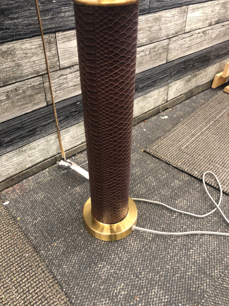 FAUX LEATHER GOLD BASE LAMP W/TAN SHADE.