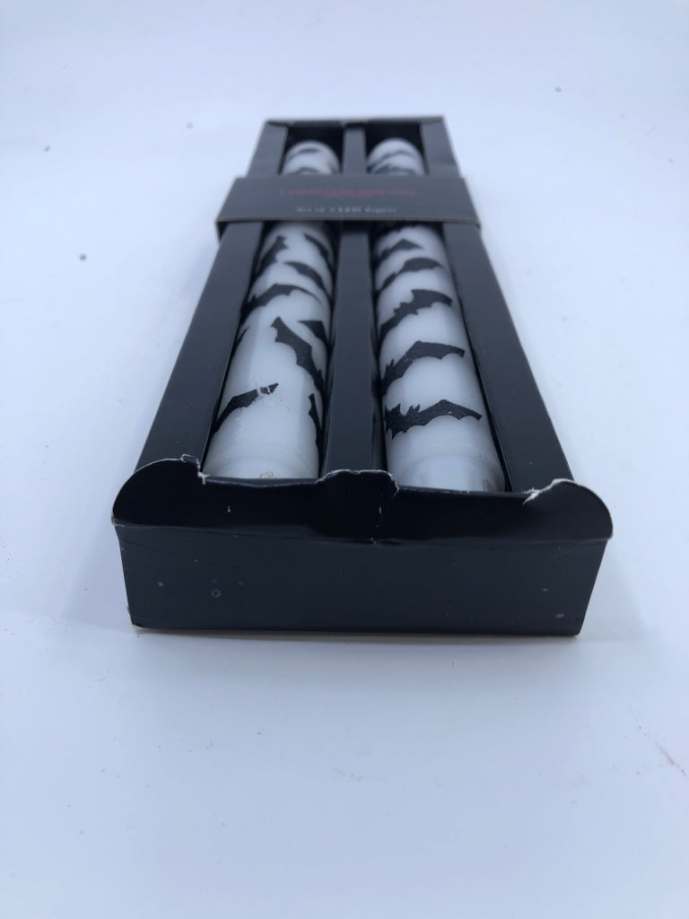 NIP BAT TAPER LED CANDLES.