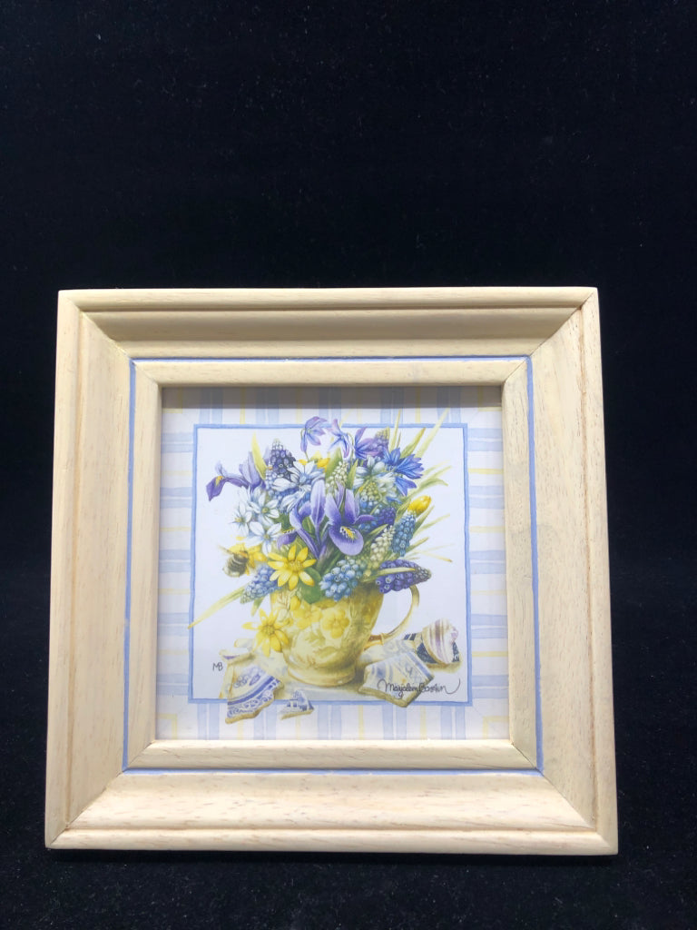 PURPLE FLORAL IN CREAM FRAME WALL HANGING.