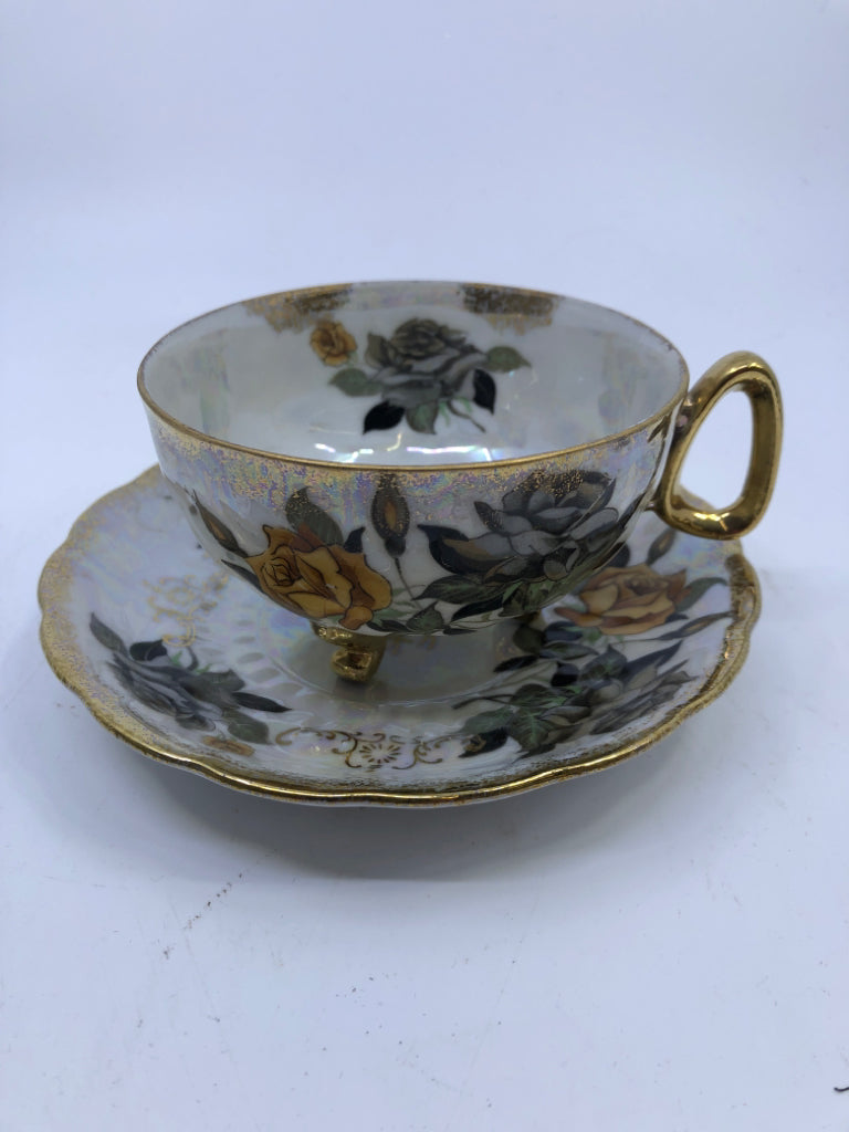 GOLD/GREY IRIDESCENT FLORAL TEACUP AND SAUCER.