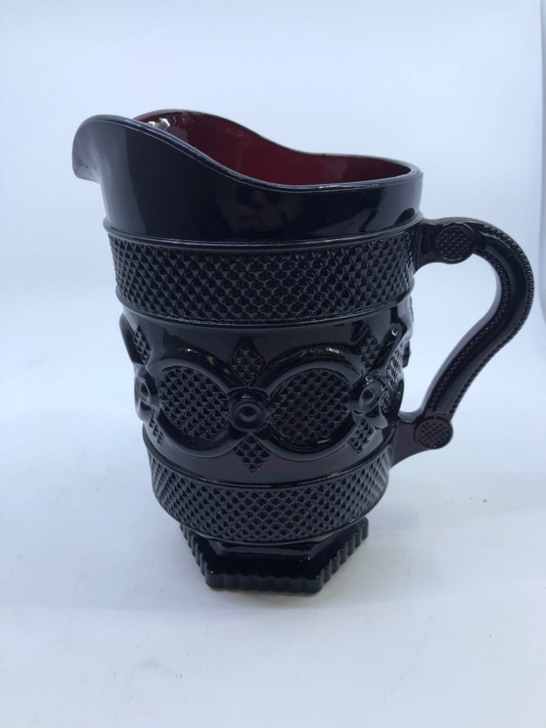 VTG FOOTED CRANBERRY GLASS CUT PITCHER.