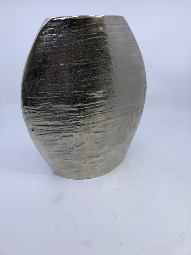 SILVER TEXTURED METAL VASE.