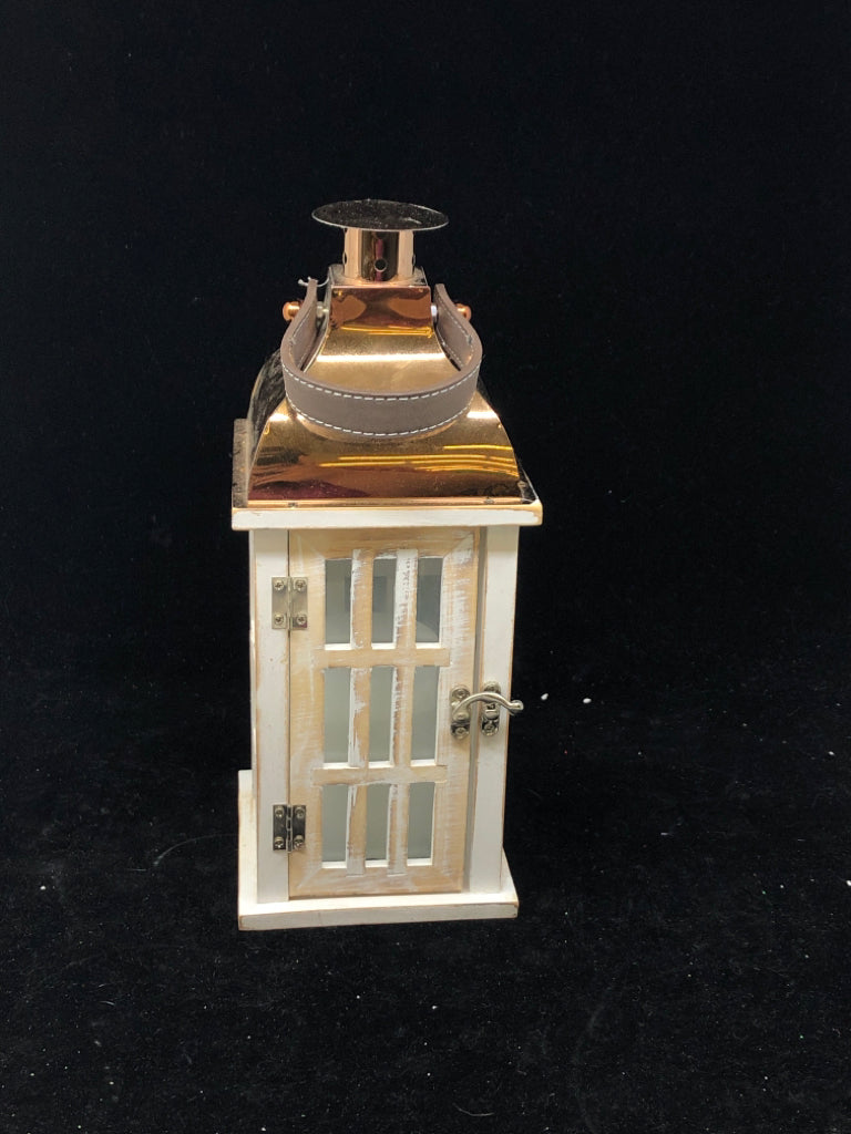 WHITE DISTRESSED LANTERN W/ COPPER ROOF LEATHER HANDLE.