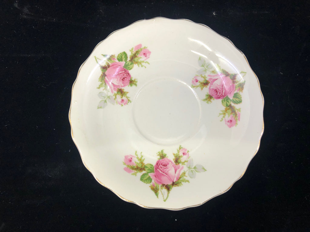 WHITE W PINK ROSES TEACUP AND SAUCER.