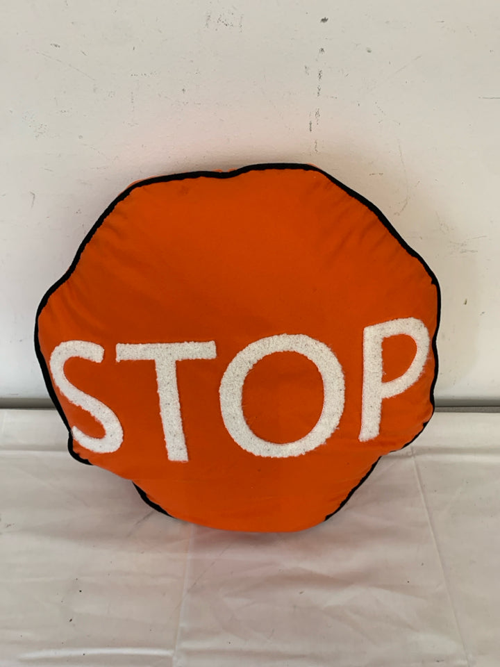 ORANGE STOP SIGN PILLOW.