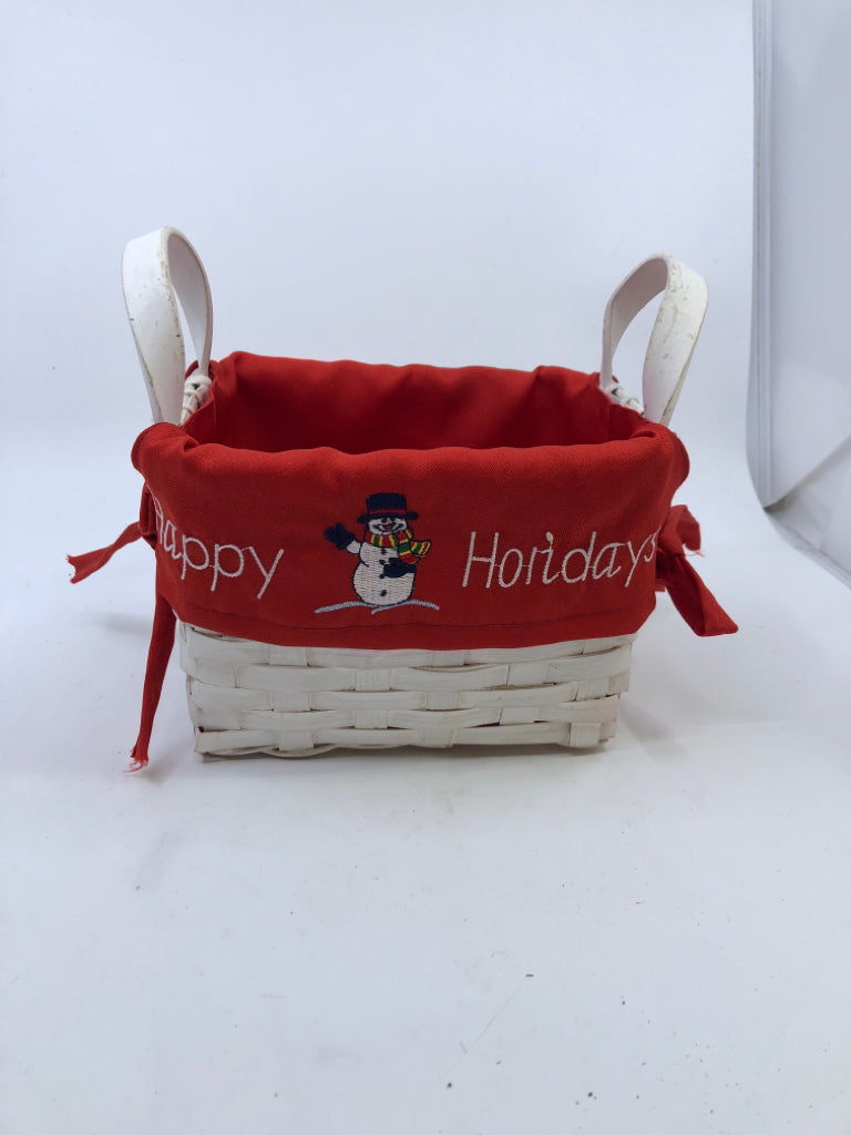 HAPPY HOLIDAYS SNOWMAN W RED LINER BASKET AND HANDLES.