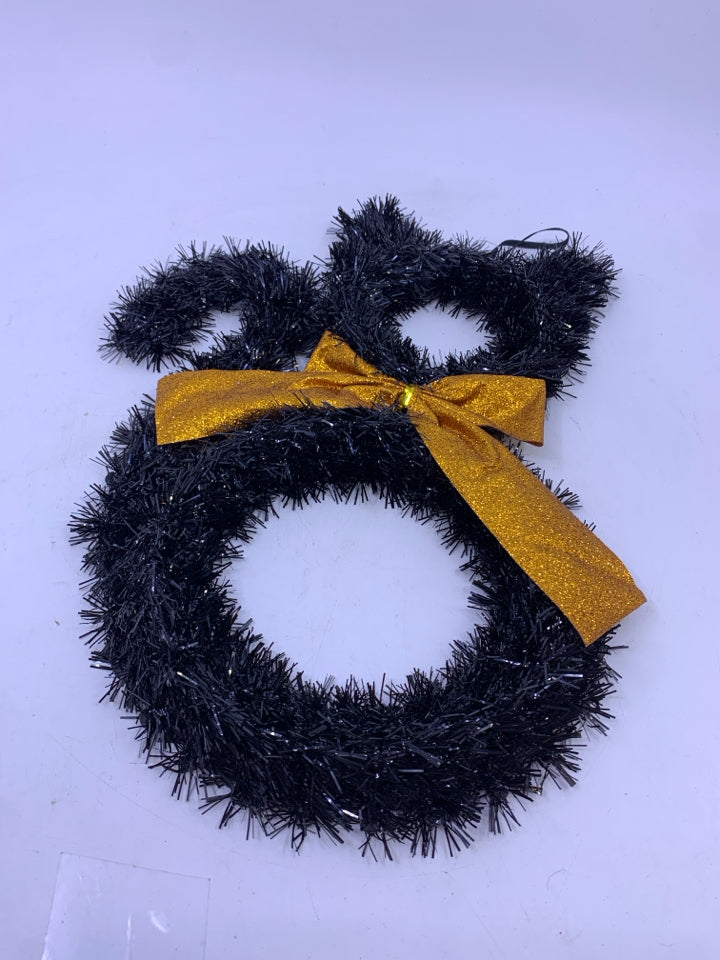 BLACK CAT TINSEL WREATH WITH ORANGE GLITTER RIBBON.
