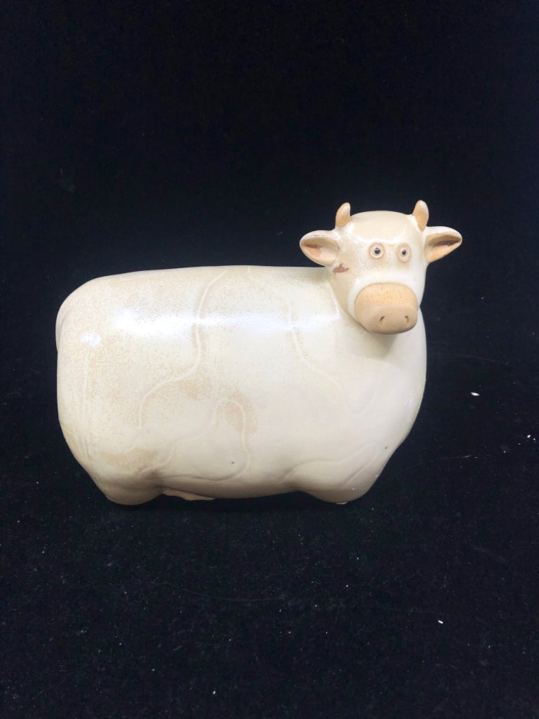 TAN CERAMIC COW.