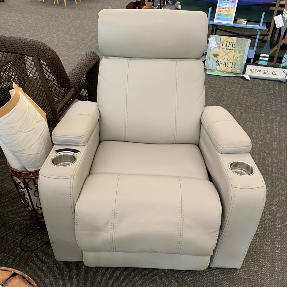 ASHLEY FURNITURE CREAM LEATHER RECLINING LOUNGE CHAIR W/TAGS.