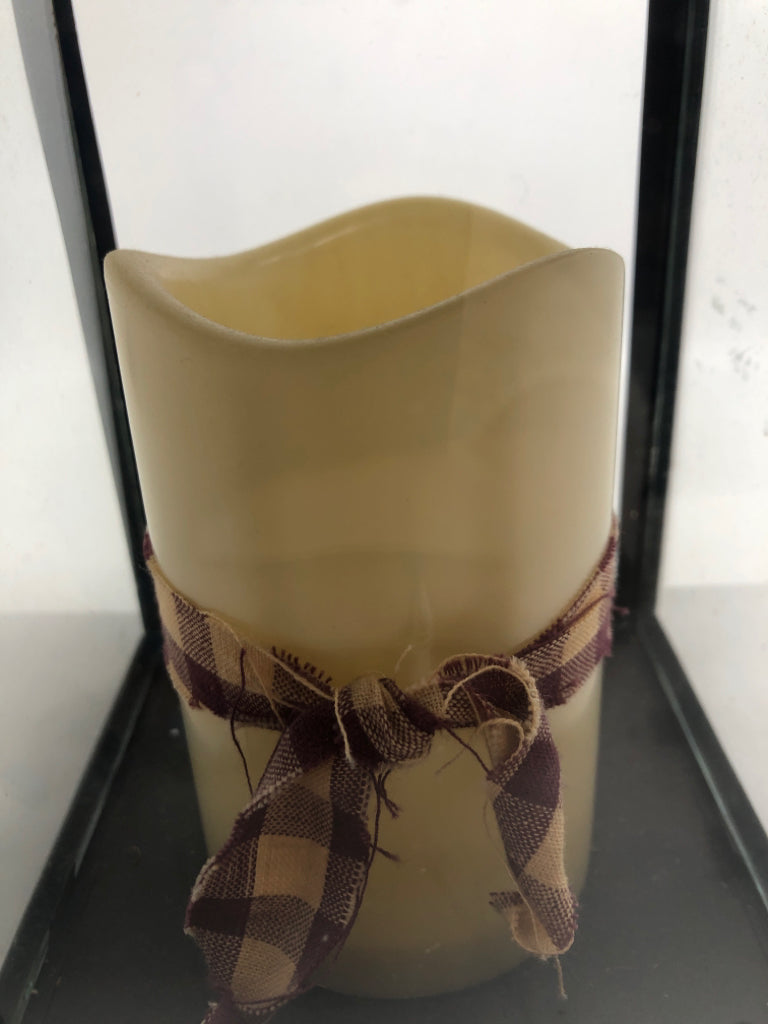 FAUX CANDLE IN BLACK LANTERN.