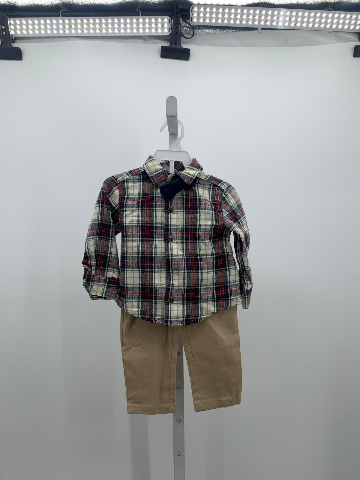 PLAID SHIRT TAN PANTS AND BOW TIE