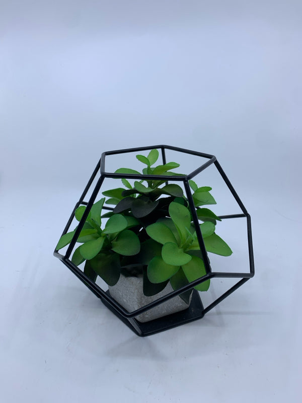 BLACK CAGE W/ FAUX PLANT W/ SQUARE CEMENT PLANTER.