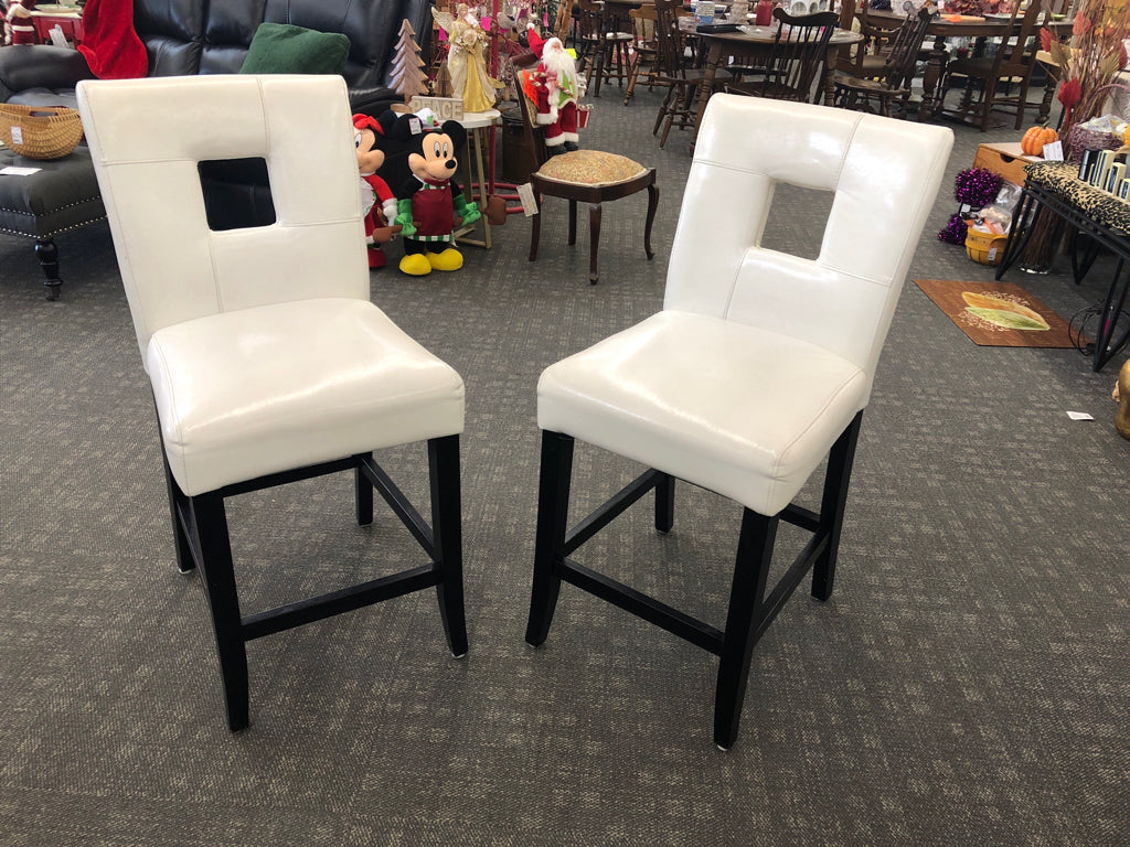 2 FAUX WHITE LEATHER W BLACK LEGS COUNTER HEIGHT STOOLS.