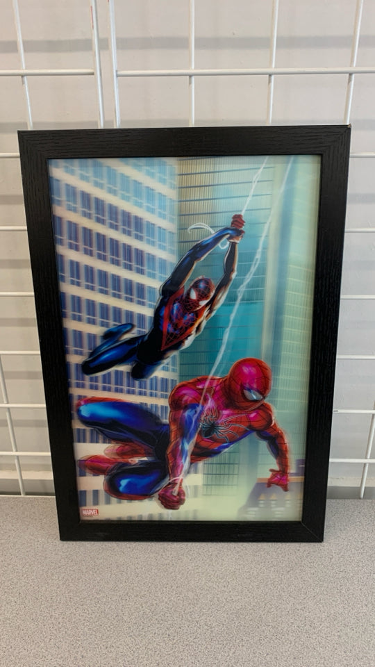 SPIDERMAN MOVING PRINT IN WOOD BLACK FRAME.