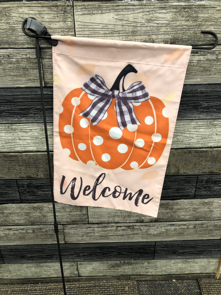 "WELCOME" PUMPKIN FLAG ON POLE.