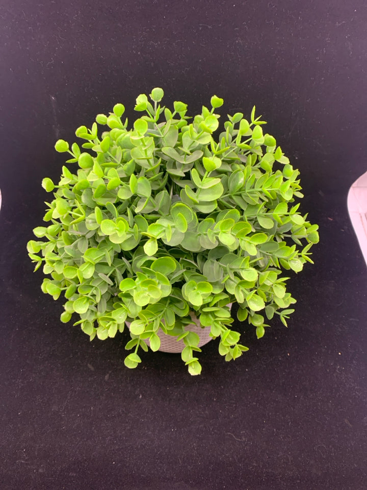 FAUX GREEN IN WHITE PLANTER.