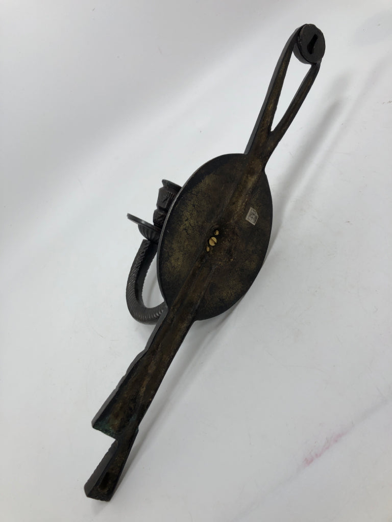 BROWN METAL TAPER CANDLE WALL SCONCE.