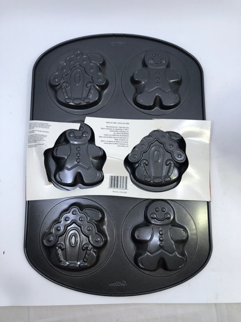 NIP WILTON GINGERBREAD HOUSE/MAN PAN.