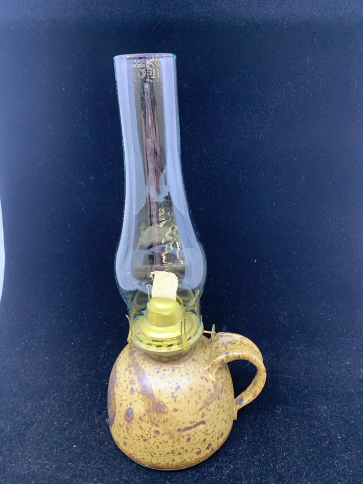 TAN W/ BROWN SPECKLES POTTERY BASE OIL LAMP W/ GLASS SHADE.