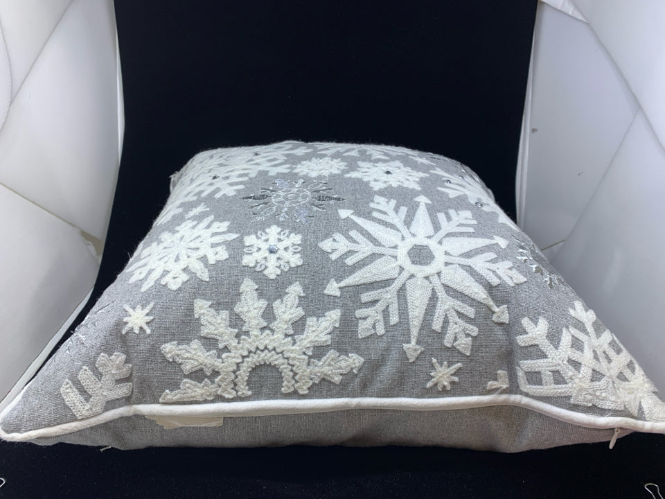 SILVER SNOWFLAKE SQUARE PILLOW.