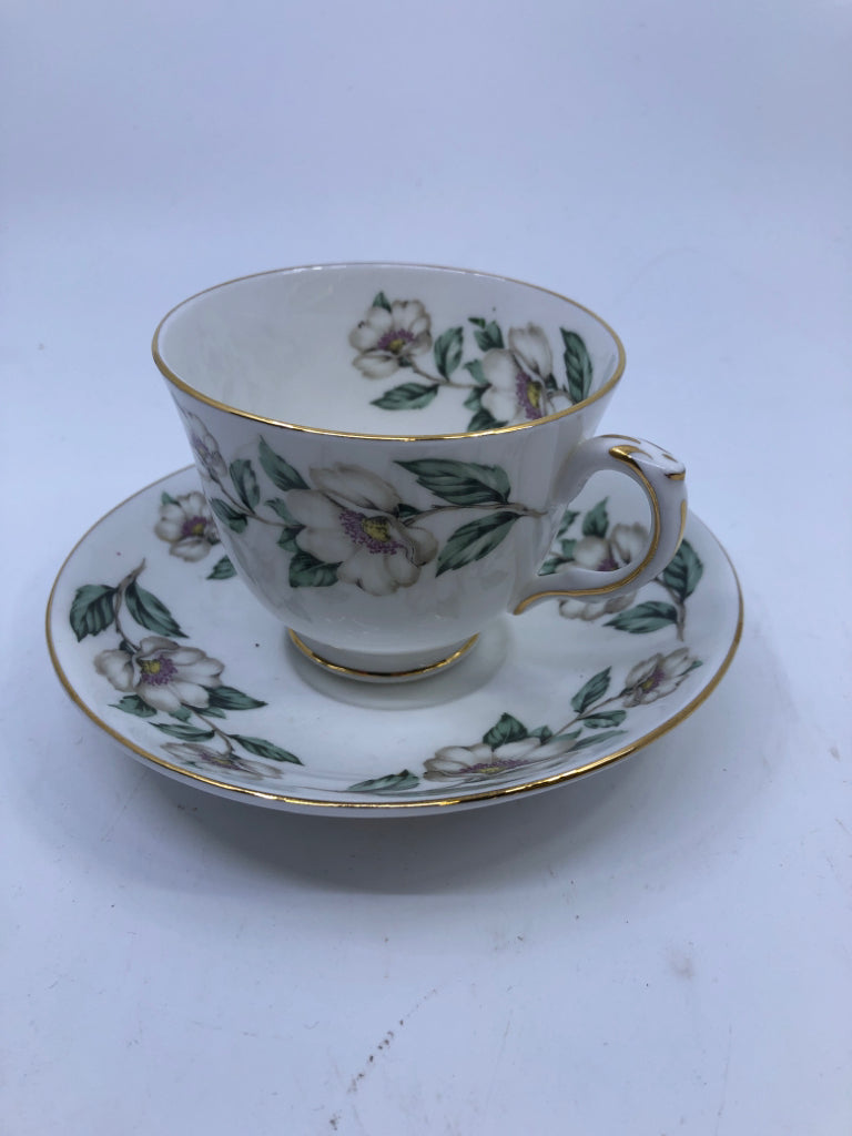 VTG WHITE FLORAL TEACUP AND SAUCER.