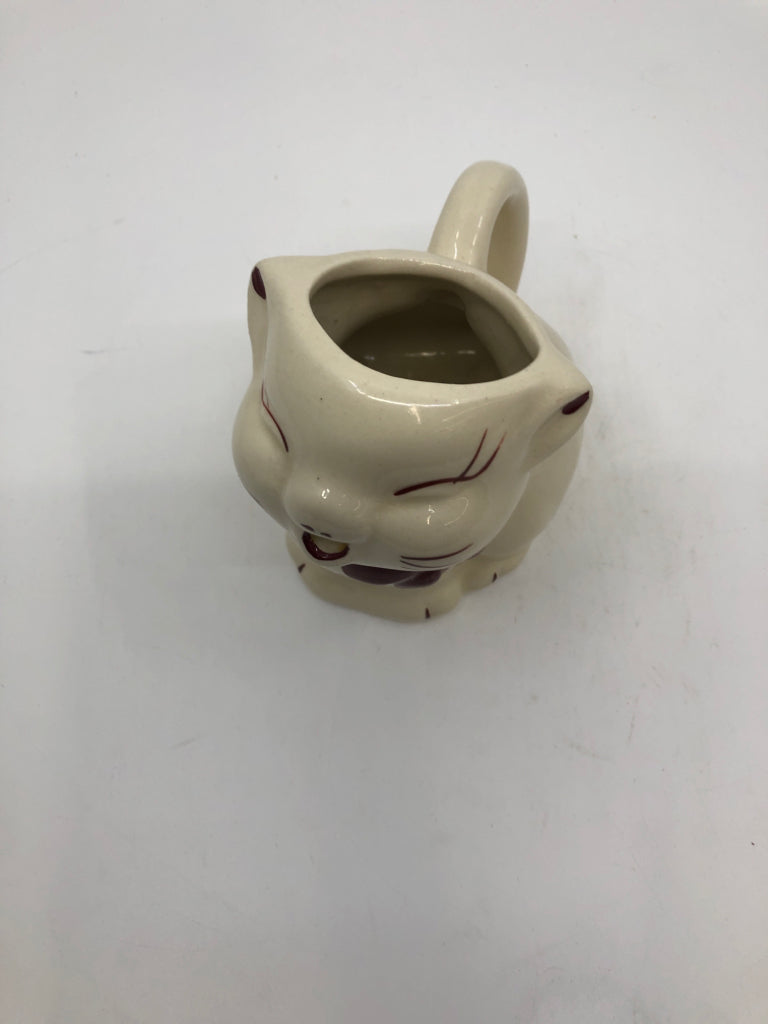 VTG CREAM CAT PITCHER W/ RED ACCENTS.