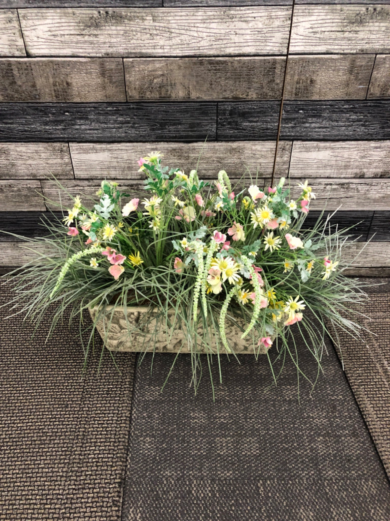 FAUX WILDFLOWERS IN HEAVY FAUX-STONE PLANTER.