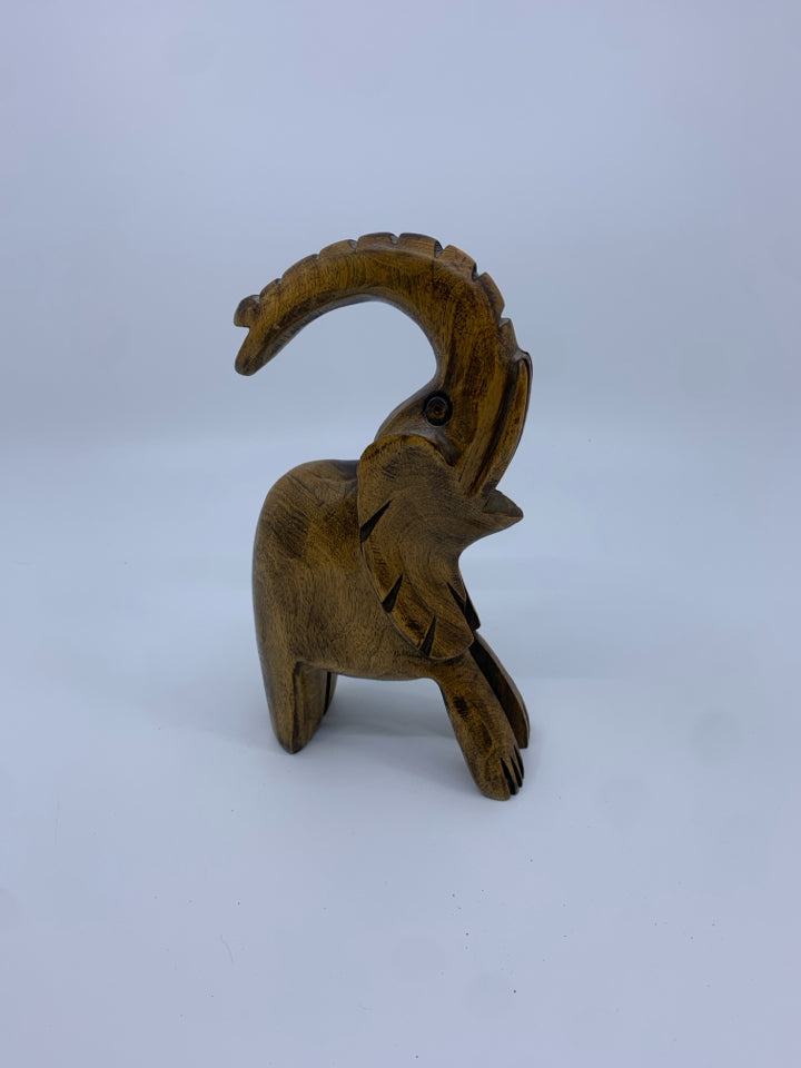 WOOD TWO TONED ELEPHANT FIGURE.