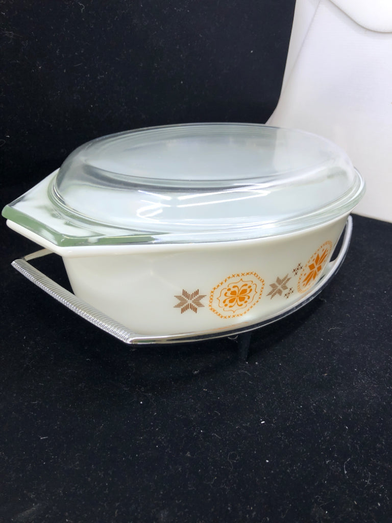 VTG OVAL ORANGE AND BROWN COVERED BAKING DISH W METAL HOLDER.