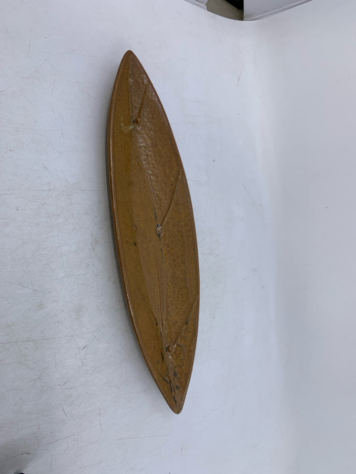 TAN SHALLOW TEAR DROP BOWL.